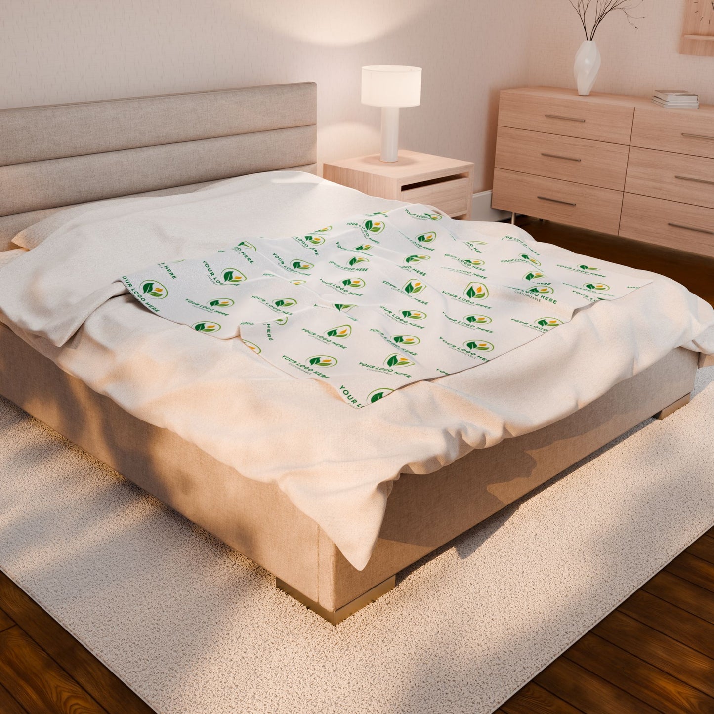 Bed with white bedding featuring avocado patterns in a bedroom setting.