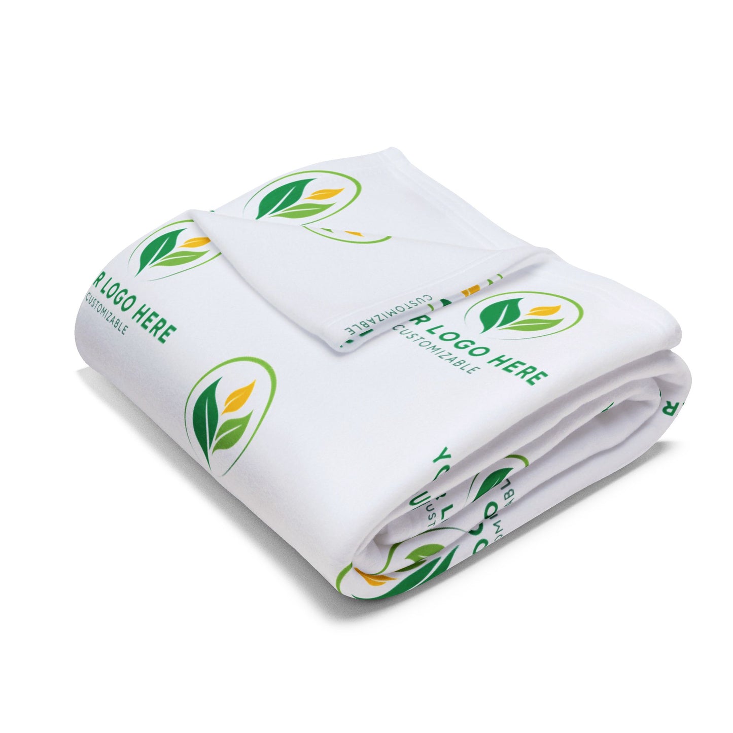 Folded white blanket with green leaf logos on a white background