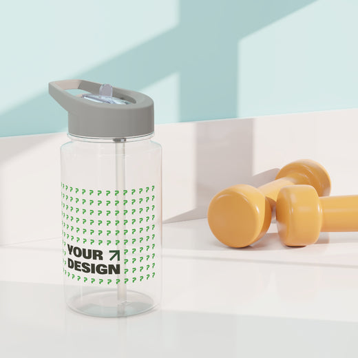 Clear water bottle with gray lid and green text on a light blue background