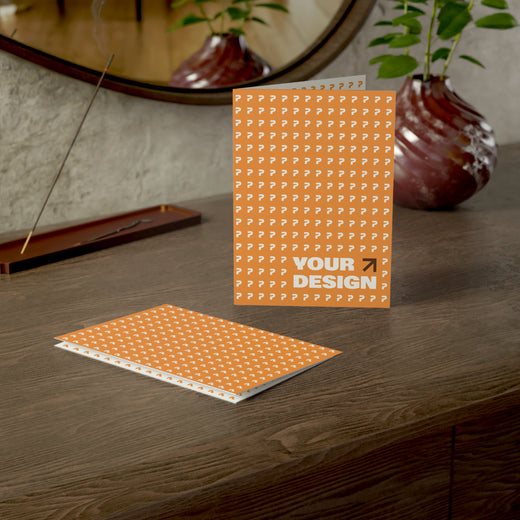 Notebook with 'Your Design' text on a wooden surface with decorative elements.