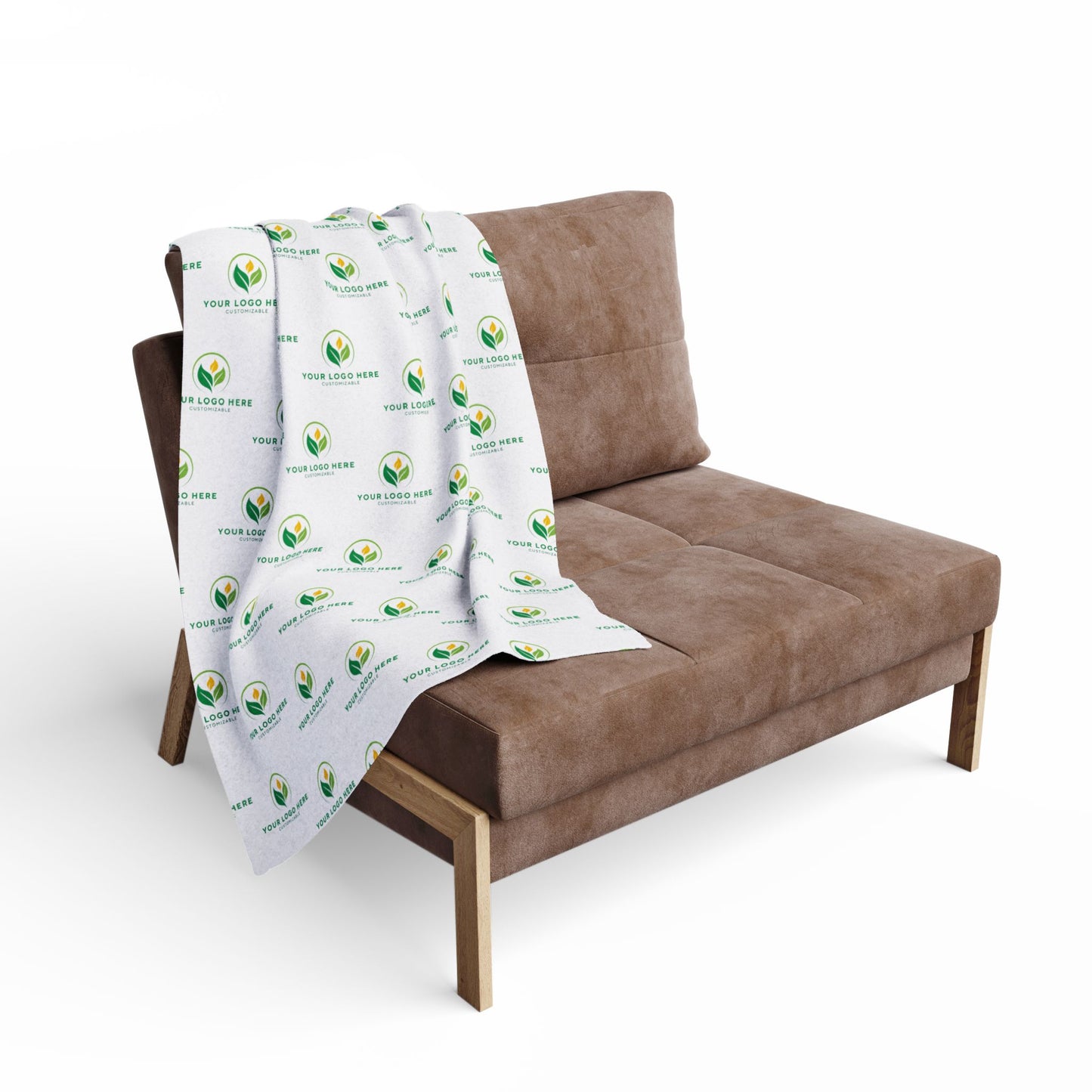 Brown sofa with a white blanket featuring green logos on a white background