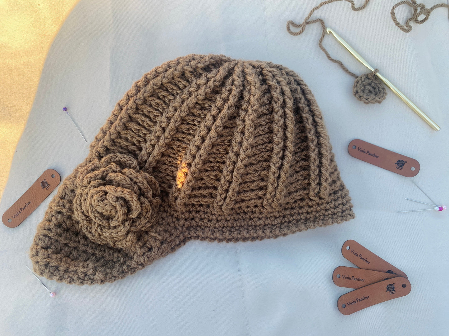 side view of brown flower girl hat
