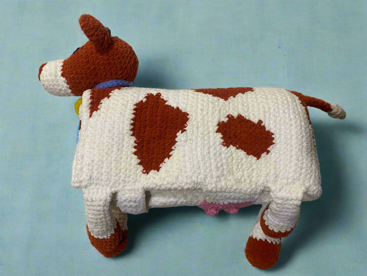 side view of crochet brown cow