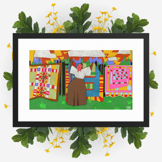 Gee’s Bend inspired framed poster with colorful quilts hanging on a line outdoors