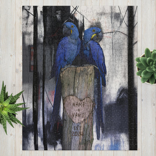A jigsaw puzzle depicting two blue hyacinth macaws perched on a wooden stump with a custom name label, surrounded by a blurred background.