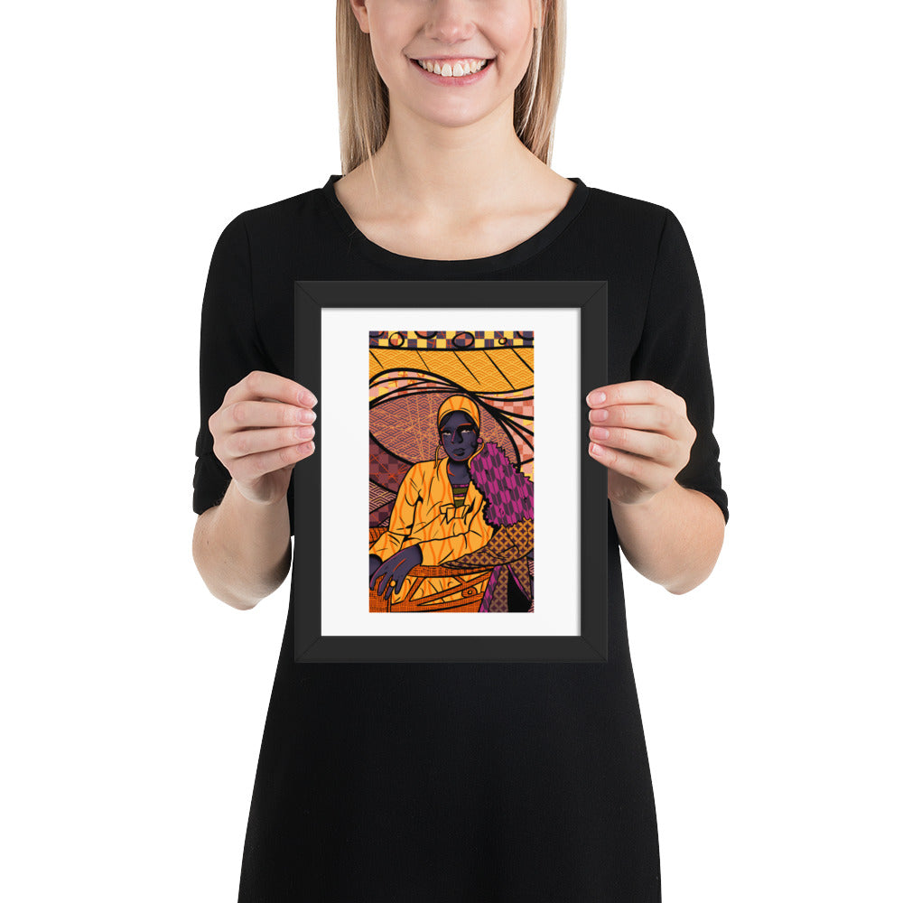 Person holding a framed artwork of a person in a colorful setting
