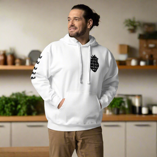 man wearing Yahuah’s Laws unisex hoodie in white, featuring the phrase 'Yahuah’s Laws' printed vertically on the sleeve and a symbolic emblem on the chest; made of cotton-blend fleece with pouch pocket and 3-panel hood.