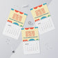Three personalized calendar sheets with colorful designs on a light gray background.
