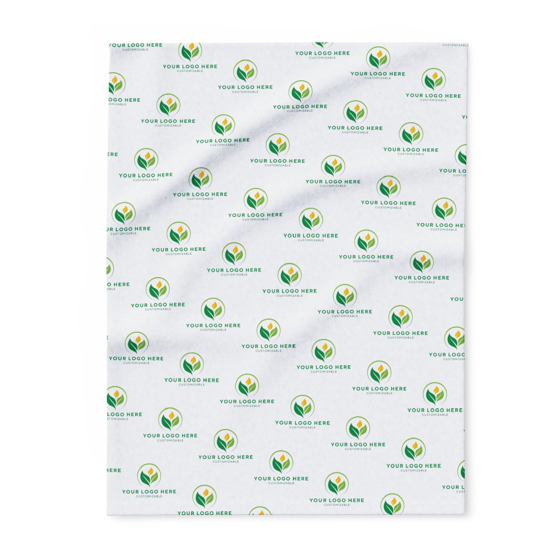 Patterned blanket with green and yellow logo repeats on a white background