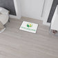 Customizable logo mat on a wooden floor with a room setting.