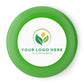 Green frisbee with customizable logo area on a white background