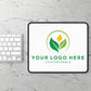 Tablet with customizable logo on a marble surface with keyboard