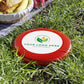 Red frisbee with customizable logo on grass