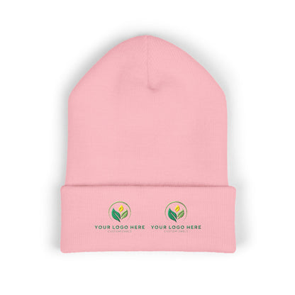 Pink beanie with customizable logos on a white background