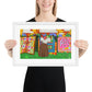 Gee’s Bend inspired framed poster with colorful quilts hanging on a line outdoors