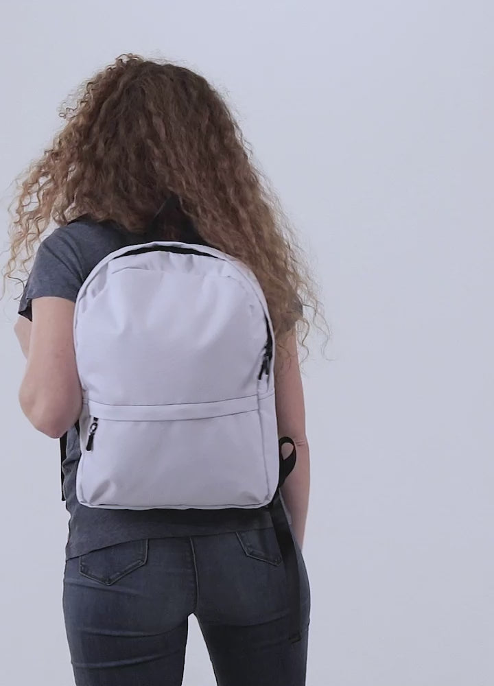 White backpack with customizable logo design on a white background